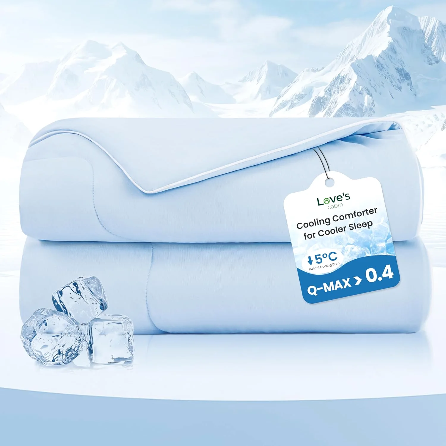 Love's Cabin cooling comforter folded with ice cubes beside it